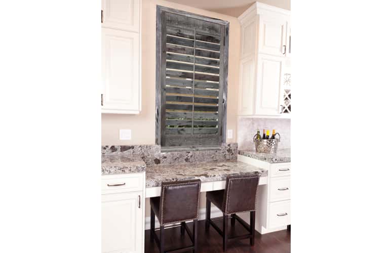 Kitchen window with reclaimed wood shutters in Indianapolis